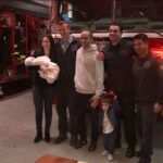 Family reunites with firefighters who helped deliv...