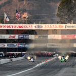 Plane crashes into parking lot near track during NHRA season finale at Pomona Dragstrip