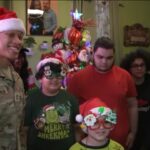 U.S. Army soldiers deliver presents to Bronx famil...