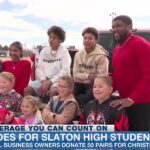 Small business owners donate shoes to students at Slaton High School