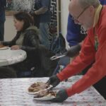 ‘A big family:’ Bean’s Cafe in Anchorage serves Christmas Eve meals to those without