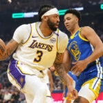 Lakers star Anthony Davis leaves Christmas game vs. Warriors early after rolling ankle