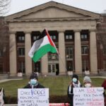 ‘We are not OK’: In Mission Hill, health care workers rally for Gaza