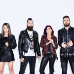 Skillet’s John Cooper Has Some Business Advice for His Younger Self