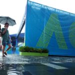 Heavy rain disrupts day one at Australian Open