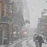 Record-breaking snow triggers flight cancellations, school and business closures in U.S. South