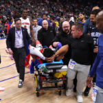 Pistons G Jaden Ivey exits court in stretcher afte...