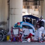 Neighborhood rocked by homeless camp triple murder as former police officer calls for government to intervene