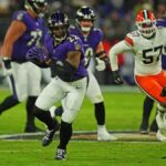 Derrick Henry ties Jim Brown in NFL record book, helps Ravens secure AFC North title on 31st birthday